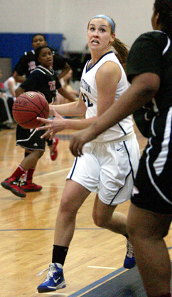 JACOBS’ LADDER: Princeton High girls’ basketball player Liz Jacobs heads to the hoop in recent action. Junior forward ­Jacobs, a lacrosse star who has already committed to play that sport at Dartmouth, is using her lacrosse mentality to be more aggressive on the basketball court this winter. Last Thursday, Jacobs scored a team-high nine points as PHS fell 57-27 to Lawrence. Jacobs will be looking to help PHS, now 2-10, get on the winning track when it hosts Hightstown on January 31.(Photo by Frank Wojciechowski)