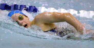 BREAKING FREE: Princeton High girls’ swimming star Madeleine Deardorff displays her freestyle form in a recent race. Last week, precocious freshman Deardorff won both the 200 individual medley and the 500 free to help PHS to a 125-45 win over Notre Dame. The Little Tigers, now 10-0, wrap up regular season action with a meet at Hamilton on January 24 before competing in the Mercer County Championships from January 31-February 2 at Lawrence High. (Photo by Frank Wojciechowski)