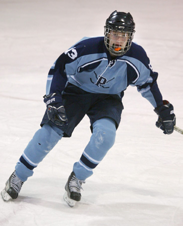 REID AND REACT: Princeton High boys’ hockey player John Reid skates up the ice in recent action. Sophomore forward Reid’s strong play of late has helped the Little Tigers start 2013 with three straight wins. PHS, now 6-4-1, faces Nottingham on January 25 at Mercer County Park before playing Cranford High on January 28 at Warinanco Park in Elizabeth.(Photo by Frank Wojciechowski)