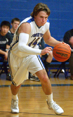 DECKHAND: Princeton Day School boys’ basketball player B.J. Dudeck heads to the basket in a game earlier this season. Last Friday, senior forward Dudeck contributed 10 points as the Panthers topped Hightstown 71-44 to improve to 12-5. In upcoming action, PDS plays at Life Center Academy on February 1 before hosting Pennington on February 5.(Photo by Frank Wojciechowski)