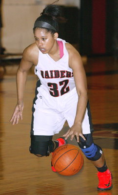 BOUNCING BACK: Hun School girls’ basketball star Erica Brown dribbles up court in recent action. After being sidelined recently due to a knee injury, junior star Brown is back at full speed for the Raiders. Last Saturday, Brown scored a team-high 19 points in a 65-62 double overtime loss at the Freire Charter School in Philadelphia as the Raiders moved to 10-7. In upcoming action, Hun plays at Padua Academy (Del.) on January 31 and at North Brunswick High on February 2.