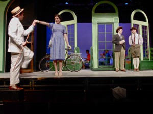 SCENTS AND SENTIMENTS: Smooth-talker Steven Kodaly (Kenny Francoeur) romances a smiling Ilona Ritter (Katrina Michaels), as perfume shop employees Sipos (Tommy Prast) and Arpad (Brad Wilson) look on in Princeton Summer Theater’s production of the 1963 romantic musical “She Loves Me,” playing at the Hamilton Murray Theater on the Princeton University campus through June 30.