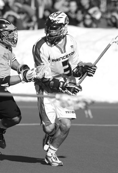 DOUBLE THREAT: Whitney Hayes heads to goal during his career with the Princeton University men’s lacrosse team. Hayes, a 2007 Princeton alum, was a hometown hero before heading across town for college, starring at lacrosse and soccer for Princeton High as he produced one of the most decorated two-sports careers in school history. This Saturday, Hayes’ excellence on two fronts is being recognized when he will be inducted into the PHS Athletics Hall of Fame as part of its eighth class of honorees.(Photo Courtesy of Princeton’s Office of Athletic Communications)