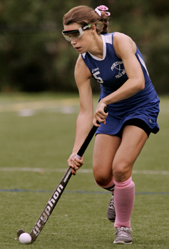 FEELING LOW: Princeton High field hockey senior star ­Emilia Lopez-Ona takes the ball upfield in recent action. Last Thursday, Lopez-Ona and her teammates played their hearts out as they fell to Hopewell Valley on strokes in the Mercer County Tournament semifinal in a game that was scoreless through regulation and 20 minutes of overtime. PHS, now 12-4-1, will start action in the Group III North Jersey, Section 2 sectional where it is seeded fifth and will play at No. 4 Warren Hills on October 30.(Photo by Frank Wojciechowski)