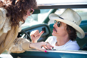 MAKING SOME LAST MINUTE BUSINESS DECISIONS: Rayon (Jared Leto, left) confers with partner Ron Woodroof (Matthew McConaughey). The pair started the Dallas Buyers Club, a business that supplied drugs for AIDS patients that were not legally available in the United States.