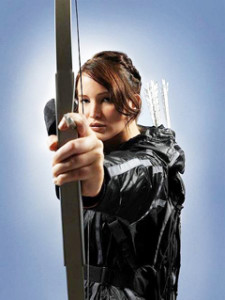 FIGHTING FOR HER LIFE: Expert archer Katniss Everdeen (Jennifer Lawrence) takes aim at an enemy in the Quarter Quell tournament. She was forced to take part in it, in the hope by the government, that her death would silence the revolutionary feelings amongst the poverty stricken masses that she and her partner Peet (Josh Huthcerson, not shown) aroused in their speeches during their victory tour that they were on after they won the latest Hunger Games competition.