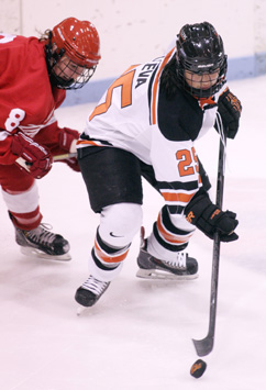 PRICKLY ROSE: Princeton University women’s hockey player Rose Alleva goes after the puck in recent action. Senior defenseman Alleva totaled three goals and an assist last weekend as Princeton lost 5-4 to No. 3 Cornell on Friday and then rebounded with a 6-2 win over Colgate a day later. The Tigers, now 2-2 overall and 2-2 in ECAC Hockey action, play at Yale on November 8 and at Brown on November 9.(Photo by Frank Wojciechowski)