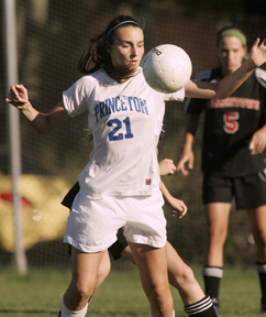 JOLLY ROGERS: Princeton High girls’ soccer player Ally ­Rogers eyes the ball in a recent game. Last Monday, senior forward Rogers scored two goals as third-seeded PHS topped No. 14 Jackson Liberty 6-0 in the opening round of the Central Jersey Group III sectional. PHS, the defending sectional champions, will host 11th-seeded Hightstown in the quarterfinals on November 7.(Photo by Frank Wojciechowski)