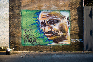 GHANDI IN THE ALLEY: The likes of this 2008 mural by the graffiti writer known as "Kasso" are the subject of an exhibition of photogrpahs by Ricardo Barros on view at Trenton's Gallery 219. (Courtesy of Ricardo Barros)