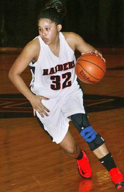 UP-TEMPO: Hun School girls’ basketball star Erica Brown races up the court in a game last season. Senior forward Brown gives Hun versatility in the frontcourt with her speed and inside-out game. The Raiders start their 2013-14 season by playing at Friends Central School (Pa.) on December 4.(Photo by Frank Wojciechowski)