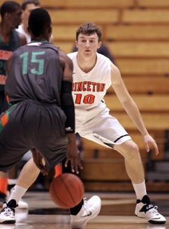 WEISZ BEYOND HIS YEARS: Princeton University men’s basketball player tracks a foe in recent action. Freshman Weisz has made an immediate impact for the Tigers, starting from day one and averaging 8.9 points and 4.9 rebounds a game. Last Saturday, Weisz achieved his first college double-double with 17 points and 10 rebounds as Princeton topped Fairleigh Dickinson 77-65. He was later named the Ivy League Rookie of the Week for his performance. The Tigers, now 6-1, play at Rutgers on December 11 and at Penn State on December 14.(Photo by Frank Wojciechowski)