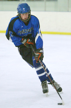 COOL CUSTOMER: Princeton Day School girls’ hockey player Mary Travers controls the puck in a game last winter. Senior forward Travers is coming off a 10-goal season and should be a primary offensive threat for the Panthers in her final campaign with the program. PDS starts the season by playing at the Hill School (Pa.) on December 4 and then hosting its annual Harry Rulon-Miller ’51 Invitational from December 7-8.(Photo by Frank Wojciechowski)