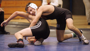 PINNING IT DOWN: Princeton High wrestler Thomas Miers, right, takes control in a match earlier this season. Junior star Miers has emerged as a force this winter at 132 pounds, going 20-2 with six pins. This weekend, Miers will be looking to pick up more wins as PHS competes in the Mercer County Tournament at Robbinsville.(Photo by Frank Wojciechowski)