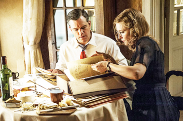 THESE ITEMS ARE PRICELESS: Two of the seven experts who were chosen to retrieve the art objects that were plundered by the Nazis during World War II are shown examining one of their finds. James Granger (Matt Damon, left) and Claire Simone (Cate Blanchettt) carefully examine some documents in the hope that it will reveal more clues about where other stolen art objects have been hidden.