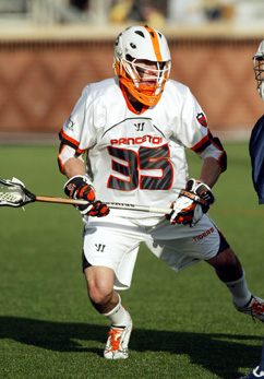 JACK BE NIMBLE: Princeton University men’s lacrosse player Jack Strabo marks a foe in 2013 action. Last Saturday, senior defensive midfielder and tri-captain Strabo scored a goal as 12th-ranked Princeton topped No. 13 Penn 15-12 in the Ivy League opener for both teams. The Tigers, now 3-2 overall and 1-0 Ivy, have a busy week as they were slated to play at Villanova on March 18 and at 16th-ranked Yale (3-2 overall, 0-1 Ivy) on March 22.(Photo by Frank Wojciechowski)