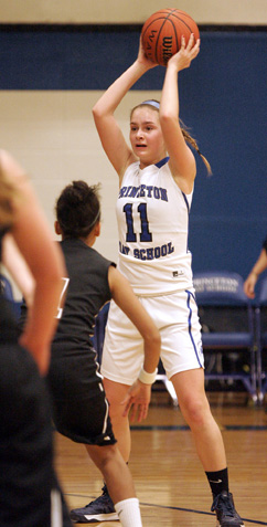 HOPE FOR THE FUTURE: Princeton Day School girls’ basketball player Hope Anhut looks to pass the ball in a game this winter. Sophomore guard Anhut helped a youthful Panthers squad make progress under new head coach Kamau Bailey. After losing its first five games, PDS ended the season with a 3-11 record.(Photo by Frank Wojciechowski)