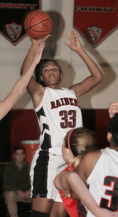 MISSING PIECE: Hun School girls’ basketball player Johnnah Johnson puts up a shot in action this season. Senior star center and Robert Morris University-bound Johnnah Johnson injured her knee early in winter and missed 12 games. She returned down the stretch to pass the 1,000-point mark in her career and help Hun reach the Mid-Atlantic Prep League (MAPL) semifinals. The Raiders finished the winter with a 10-11 record.(Photo by Frank Wojciechowski)