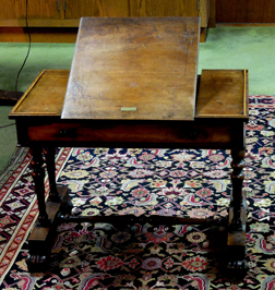 WOULD WOOD COULD SPEAK: The writing desk used by Elizabeth Barrett Browning as she worked on her poems in Italy is on display in the Department of Rare Books and Special Collections at Princeton University Library. The desk and one other belonging to her husband Robert Browning are the gift of alumnus Peter N. Heydon, (Class of 1962) and will be on display at the Firestone Library through June 6.   (Photo by Don C. Skemer)