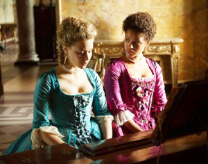 BEST FRIENDS FOR LIFE: Two orphaned cousins, Elizabeth (Sarah Gadon, left) and Dido Belle (Gugu Mbatha-Raw) were taken in by their wealthy aunt and uncle to be raised on their estate in England. The cousins, who were close in age and were adopted when they were eight-years-old, soon became fast friends for life. As they were growing up, Belle’s African lineage brought her into contact with racism and slavery issues that were being debated in England at the time.