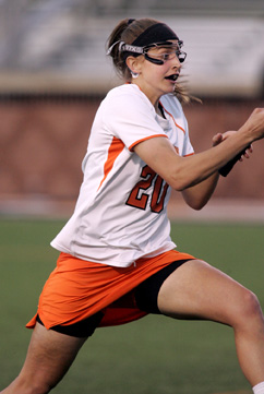 MAC ATTACK: Princeton University women’s lacrosse player Erin McMunn heads to goal last Friday against Cornell in the Ivy League tournament semifinals. Junior attacker McMunn scored a career-high seven goals in the contest to help Princeton prevail 12-5. On Sunday, McMunn led Princeton with three goals but it wasn’t enough as the Tigers fell 9-6 to Penn in the Ivy championship game. Princeton, now 11-6, received an at-large bid to the NCAA tournament and will face Penn State on May 9 in a first round contest at the University of Virginia.(Photo by Frank Wojciechowski)