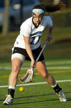 PICKING IT UP: Princeton Day School girls’ lacrosse player Morgan Foster goes after a ball in 2013 action. Last Monday, junior star Foster scored four goals in a losing cause as third-seeded PDS fell 23-16 at No. 2 Morristown-Beard in the state Prep B semifinals. The Panthers, now 5-4, are slated to have a Mercer County Tournament consolation game on May 7 and then play at Peddie on May 9.(Photo by Frank Wojciechowski)