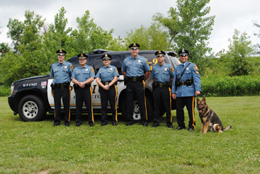 PRINCETON’S NEWEST RECRUIT: As of last Friday, the Princeton Police Department has a new officer, K9 Harris, whose keen sense of smell will be an additional tool in the Department’s efforts to keep Princeton safe. The 16-month-old Czech Shepherd, shown here with from left: Lt. Robert Toole, Police Chief Nicholas Sutter, Lt. Sharon Papp, Lt. Robert Currier, Lt. Christopher Morgan, and handler Corporal Matthew Solovay. The new K9 Unit will be part of the New Jersey Detect and Render Safe Task Force. Besides helping to find missing and/or endangered persons, K9 Harris will use his skills to track suspects and detect explosives. He is also expected to be a star of police community outreach efforts.