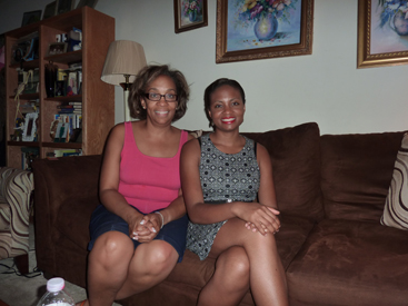 PRINCETON PERSPECTIVES: Karen Andrade-Mims and her daughter Bethany Andrade, who works as outreach coordinator for Corner House, at home in the Griggs Farm condominium. Karen was among the first to buy into the development when it was new almost 25 years ago. Bethany has just signed the contract to buy her own apartment there. This is the third story in a series on the diversity of Princeton’s residents and housing options. The first introduced Dan and Mary Beth Scheid (Town Topics, July 23) who were among the first homeowners in the residences at Palmer Square. The second (Town Topics, July 30) described the lives of Ghanaian immigrants Elizabeth Bonnah and Tony Smith and their two U.S.-born children renting an apartment with hopes to buy their own affordable unit in Griggs Farm.(Photo by L. Arntzenius)