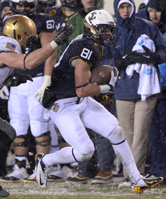 NAVAL ENGAGEMENT: Brendan Dudeck heads upfield for Navy last fall in the Midshipmen’s 34-7 win over Army. Dudeck, a former Hun School standout, is entering his senior season with Navy as one of the team’s starting receivers. The 6’0, 202-pound Dudeck made five catches for 48 yards last fall and threw for a two-point conversion in the victory over Army. (Photo by Phil Hoffmann, Courtesy of Navy Sports Information)