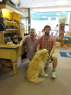 FAMILY FOOTWEAR: “We have always offered top-quality men’s, women’s, and children’s shoes. We make a point of giving customers the right fit. We have always been a family shoe store, and we are still a family business.” Chuck Simone (left), owner of Hulit’s Shoes, is shown with his son Ryan and family favorite “Sonny”.