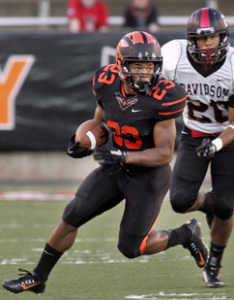 EXPLOSIVE START: Princeton University running back Dre ­Nelson heads upfield last Saturday evening in Princeton’s 56-17 win over visiting Davidson. Junior Nelson got the night off to a good start, returning the opening kickoff 89 yards for a touchdown. Nelson also scored on a 23-yard run in the second quarter and ended the evening with 203 all-purpose yards, piling up 146 yards on returns, 28 yards rushing, and 29 yards receiving. Princeton, now 1-1, plays at Columbia (0-2) on October 4 in the Ivy League opener for both teams.(Photo by Frank Wojciechowski)