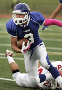 GROUND CONTROL: Princeton High running back Rory ­Helstrom runs to daylight in recent action. Last Friday, junior star ­Helstrom rushed for 205 yards and three touchdowns as PHS defeated WW/P-N 47-21 to improve to 8-1 and earn the West Jersey Football League’s Valley Division title. The Little Tigers will begin their quest for a state title as they compete in the Central Jersey Group 4 playoffs, where they are seeded seventh and will play at second-seeded Brick Township (8-1) on November 14 in a quarterfinal contest.(Photo by Frank Wojciechowski)