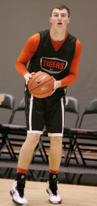 OPENING STATEMENT: Princeton University men’s basketball player Spencer Weisz prepares to put up a shot in a recent practice session. Last Friday, sophomore forward Weisz contributed a game-high 18 points as Princeton topped Rider 64-58 in the season opener for both teams. The Tigers, who fell 63-60 at George Mason on Sunday to drop to 1-1, play at Lafayette on November 19 before hosting Incarnate Word on November 22.(Photo by Frank Wojciechowski)