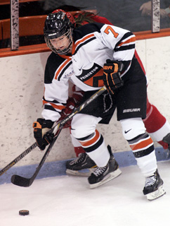 GETTING IT DONE: Princeton University women’s hockey player Jaimie McDonell goes after the puck in action last season. Junior forward McDonell has contributed five points on one goal and four assists this season to help Princeton get off to a promising start this season. Last Saturday, McDonell contributed two assists as the Tigers beat Colgate 4-2 to improve to 3-1 overall and 2-0 ECAC Hockey. Princeton hosts a two-game set against Rochester Institute of Technology (5-3-2 overall) this weekend with games slated for November 7 and 8.(Photo by Frank Wojciechowski)