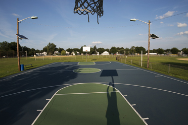 SHADOW COURT: That’s the title of this photograph by Mercer County Community faculty artist Aubrey J. Kauffman. An exhibition of Mr. Kauffman’s images of basketball courts, stadiums, soccer, and lacrosse fields is on display in the solo exhibition, “It’s Not About the Game,” in the Marguerite and James Hutchins Gallery in the Lawrenceville School’s Gruss Center of Visual Arts though January 23. A public reception with the artist will be held on Sunday, December 14, from 2 to 4 p.m. The Lawrenceville School is located at 2500 Main Street in Lawrenceville. Gallery hours are Mondays, Tuesdays, Thursdays, and Fridays from 9 a.m. to noon. and 1 to 4:30 p.m.; and Wednesdays and Saturdays from 9 a.m. to noon. The Gruss Center will be closed from December 18 through January 5. For more information, visit www.lawrenceville.org.