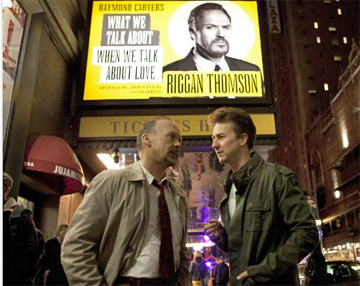 THIS PLAY HAS GOT TO SUCCEED: Underneath the Broadway marquee that is advertising the short story he has adapted to the theater, Riggan (Michael Keaton, left) discusses his plans for promoting the show with Mike (Edward Norton) one of the actors in the production. Riggan has sunk all of his savings into the venture.(Photo by Alison Rosa - © 2014 - Fox Searchlight)