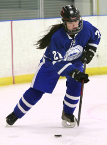 FRENCH CONNECTION: Princeton Day School girls’ hockey player Kiely French takes the puck up the ice in a game earlier this season. Last Thursday, sophomore defenseman French scored a goal to help PDS top Princeton High 3-0. The Panthers, now 4-3, are next in action when they host PHS on January 5.(Photo by Frank Wojciechowski)