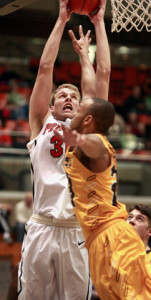 INSIDE STUFF: Princeton University men’s basketball player Hans Brase goes up for a dunk last Sunday against visiting Rowan University. Junior forward Brase scored 13 points to help Princeton defeat Division III Rowan 96-48. The Tigers, now 8-9 overall, head into the thick of Ivy League play this weekend as they host Harvard on January 30 and Dartmouth on January 31.(Photo by Frank Wojciechowski)