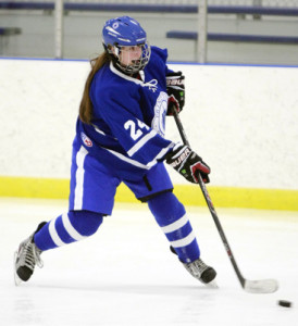 FIRING AWAY: Princeton Day School girls’ hockey player Kristi Serafin fires the puck up the ice in recent action. Last Thursday, sophomore defenseman Serafin contributed a goal as PDS defeated Mater Dei 4-1 to improve to 6-4. The Panthers play at Morristown-Beard on January 15.(Photo by Frank Wojciechowski)