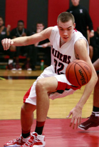 ON THE BALL: Hun School boys’ basketball player ­Dominic Robb goes after the ball in a game earlier this season. Last Wednesday, post-graduate Robb contributed 15 points to help Hun defeat the Academy of New Church (Pa.) 62-42. On Saturday, he tallied a game-high 11 points as the Raiders topped the Hill School (Pa.) 45-43 in overtime. Hun, now 5-6, hosts the Blair Academy on January 14 and Mercersburg Academy (Pa.) on January 17 before playing at Lawrenceville on January 20.(Photo by Frank Wojciechowski)