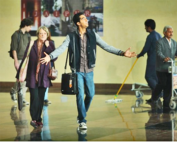 ISN’T THIS PLACE JUST PERFECT!: In his usual irrepressible manner, Sonny, (Dev Patel, center) accompanied by Muriel (Maggie Smith), raves enthusiastically about the potential of the building that they hope to turn into the second best exotic Marigold Hotel, provided they can find investors to finance their dream.(Photo by Laurie Sparham © 2014Twentieth Century Fox Film Corporation)