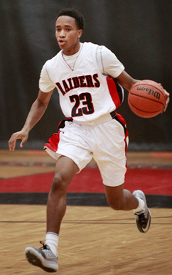 ON THE NIALL: Hun School boys’ basketball player Niall Carpenter heads up the court in a game this winter. Junior guard Carpenter provided good work in the backcourt to help the Raiders posts 14-10 record and advance to the semis of both the state Prep A tournament and the Mid-Atlantic Prep League (MAPL) tourney.(Photo by Frank Wojciechowski)