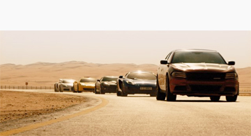 THE PACK HAS REFORMED AND IS ON THE PROWL: In order to avenge the assassination of his brother, Deckard Shaw has convinced the gang to get together and help him track down his brother’s killers. They are shown here driving their cars on their way to making Shaw’s vow for revenge come true.(Photo by Scott Garfield - © 2015 - Universal Pictures)