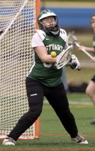 SUPER SAVER: Stuart Country Day School lacrosse goalie Harlyn Bell makes a save in a game last spring. Senior goalie Bell will be counted on to lead the Stuart defense this spring. The Tartans started the season with a 17-6 win over the Country Day School of the Sacred Heart (Pa.) last Monday, giving new head coach Kelsey O’Gorman a win in her debut. Stuart plays at the George School (Pa.) on April 7.(Photo by Frank Wojciechowski)