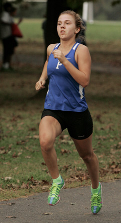 BIG STRIDES: Princeton High star runner Paige Metzheiser heads to the finish line in a cross country race earlier in her career. Last weekend at Central Jersey Group 3 sectional meet, senior Metzheiser took third in the 800 (2:20.57) and fourth in the 1,600 (5:09.22) to help PHS place fourth in the team standings.(Photo by Frank Wojciechowski)