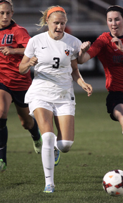 BREAKING IN: Lauren Lazo, center, goes after the ball during her career with the Princeton University women’s soccer. Lazo, a four-time All-Ivy League performer for the Tigers who graduated last month, is currently playing professionally for the  Boston Breakers of the National Women’s Soccer League. (Photo by Frank Wojciechowski)