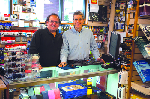 FAMILY BUSINESS: “Customer service is the reason we are one of the few independent stores still in operation. Customers know they can count on us, and on the quality and value of our product line — including our focus on office and school supplies, and so much more.” John Roberto (left) and Andrew Mangone, co-owners of Hinkson’s, The Office Store, are proud of their long-time family business.