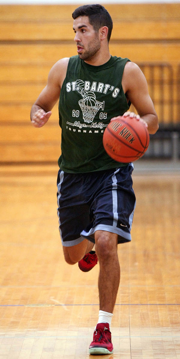 HEART AND SOUL: Tommy Soulias of Ivy Inn heads up the court in action during the championship series of the Princeton Recreation Department Men’s Summer Basketball League. Last Wednesday, Kean University star and summer league regular season MVP Soulias scored 12 points to help Ivy Inn top Bring Me Food 45-27 in Game 2 of the best-of-three series. The victory tied the series at 1-1 and Ivy Inn ended up winning the title by forfeit when Bring Me Food didn’t have enough players to field a team on Friday for the decisive Game 3.(Photo by Frank Wojciechowski)