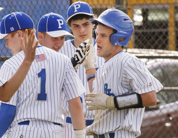 #7 on right get congrats from team mates after scoring